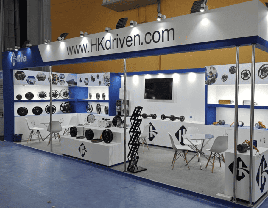 HK Driven exhibition booth featuring automotive components and product displays