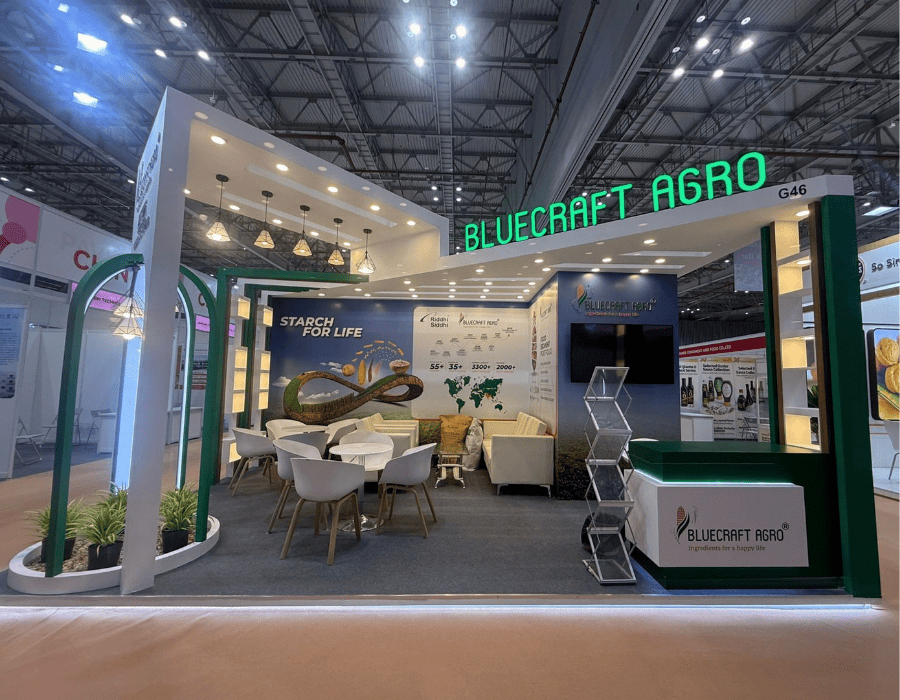 Bluecraft Agro exhibition stall design by WHTNXT featuring custom branding and modern interiors.